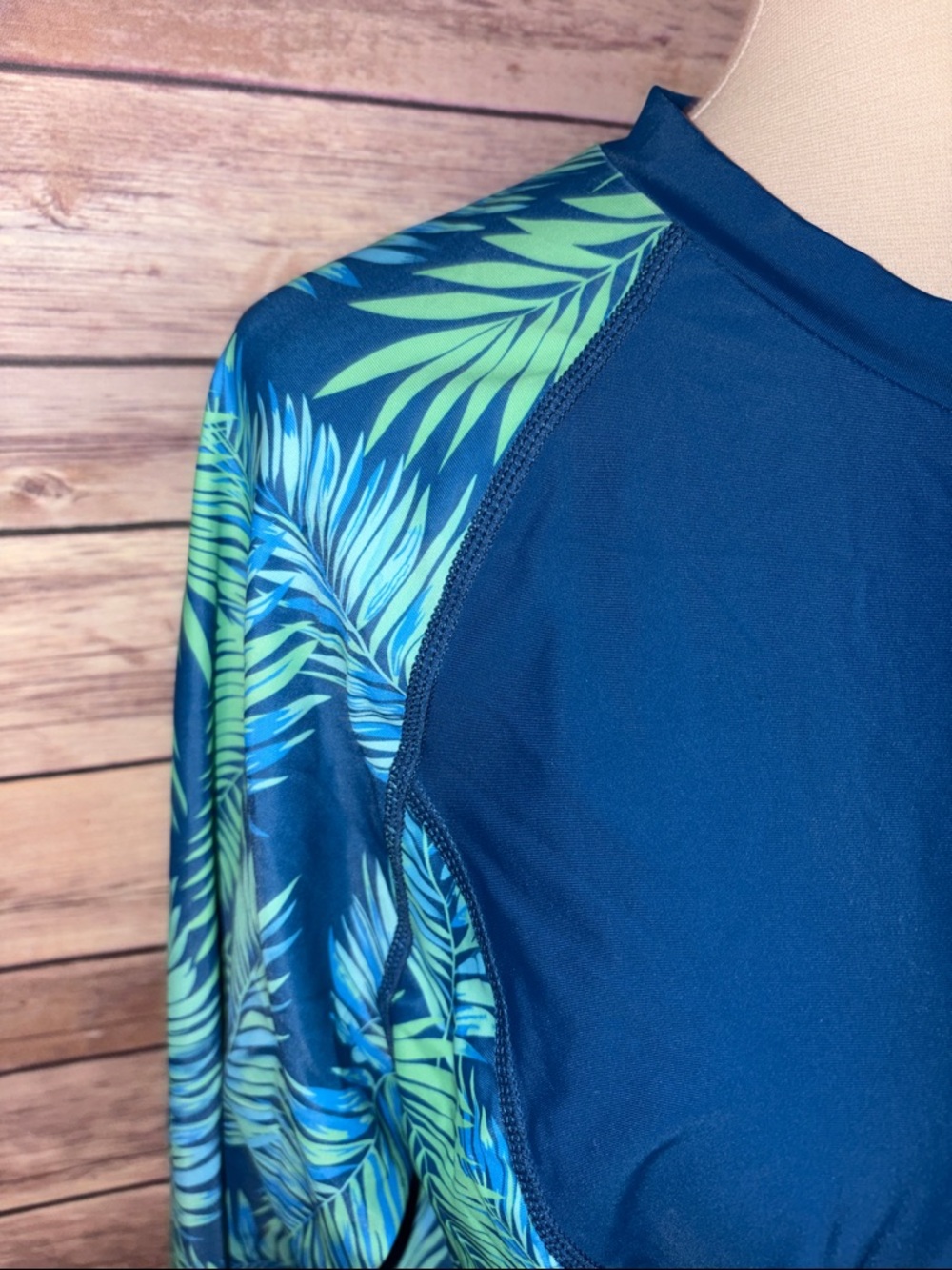 Women’s Navy Blue Zip-Front Rash Guard with Tropical Print Sleeves - Picture 2 of 4
